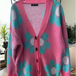Cozy woman’s button down long sweater